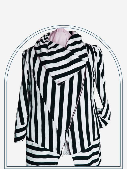 A black and white striped custom-made jacket displayed on a mannequin.